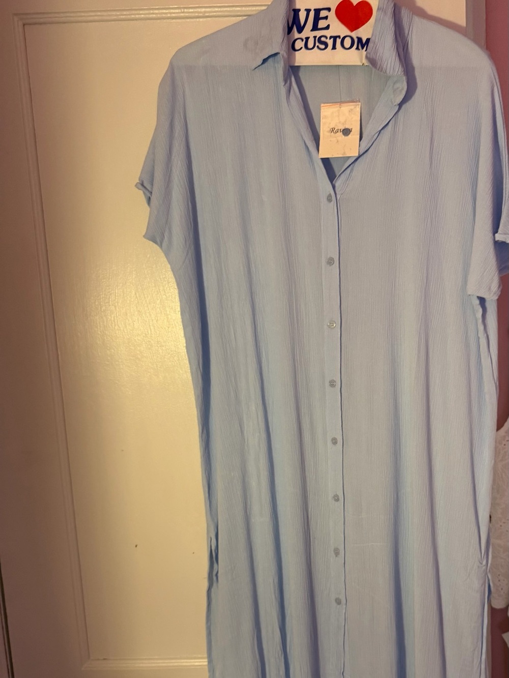 Light blue dress thin can be worn as a dress or a covering for the beach.